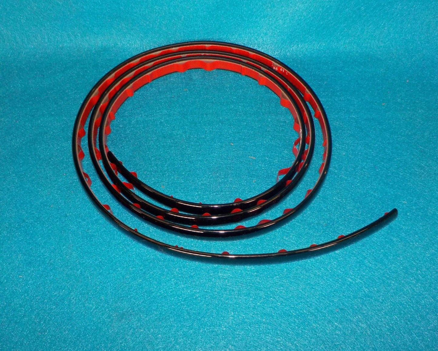 OEM NEW 1992-1995 Buick Skylark Rear Bumper Molding 22570890